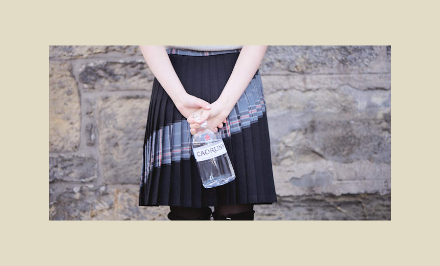 Contemporary Spirit Encapsulated In Bottle And Tartan